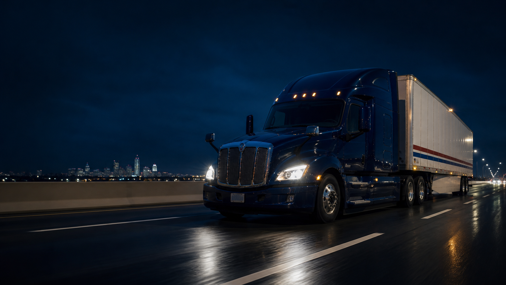 Semi truck operating on an interstate at night
